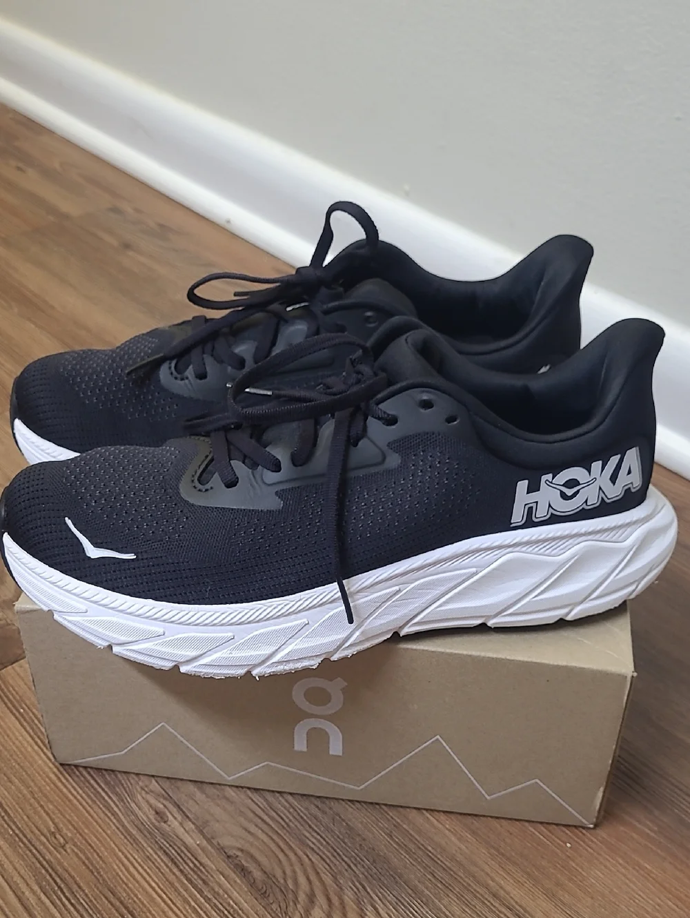 Hoka Men's  for women Black and White Cushioning Running Sneakers used good